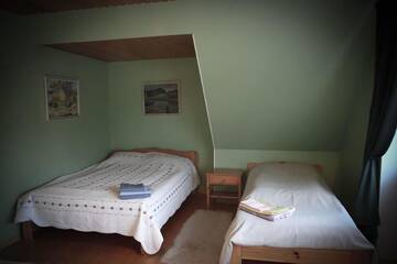 Фото номера Трехместный номер Гостевой дом Kuningatalu Holiday Home г. Выру 4
