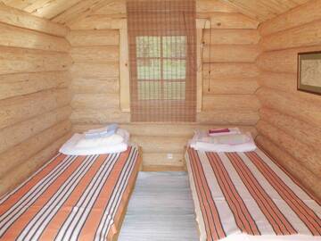 Фото номера Коттедж с общей ванной комнатой Гостевой дом Kuningatalu Holiday Home г. Выру 5