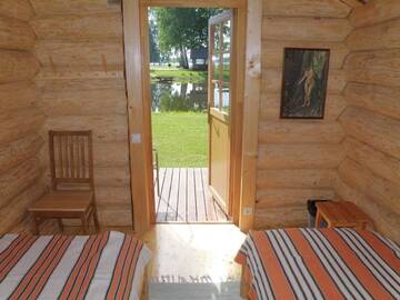 Фото номера Коттедж с общей ванной комнатой Гостевой дом Kuningatalu Holiday Home г. Выру 6
