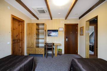 Фото номера Трехместный номер с основными удобствами Отель Ränduri Guesthouse г. Выру 3