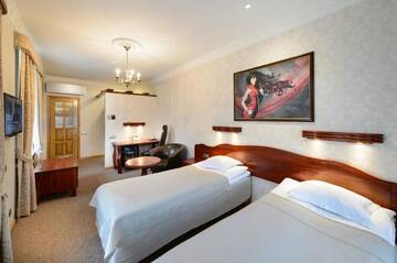 Фото номера Двухместный номер с 2 отдельными кроватями Отель Georgi Hotell г. Выру 9