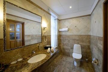 Фото номера Двухместный номер с 2 отдельными кроватями Отель Georgi Hotell г. Выру 15