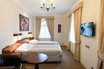 Фото номера Двухместный номер с 2 отдельными кроватями Отель Georgi Hotell г. Выру 7