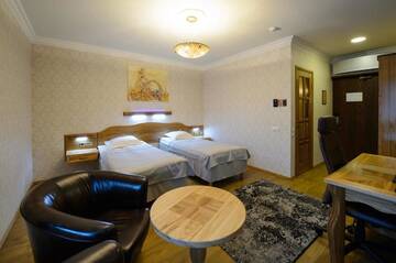 Фото номера Трехместный номер Отель Georgi Hotell г. Выру 2